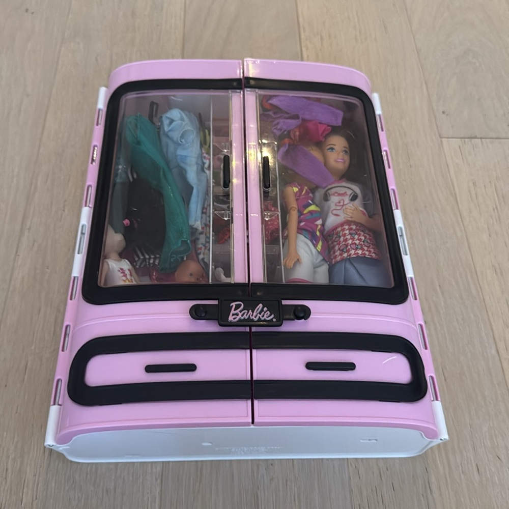 Barbie Pink Wardrobe Closet with multiple dolls and accessories